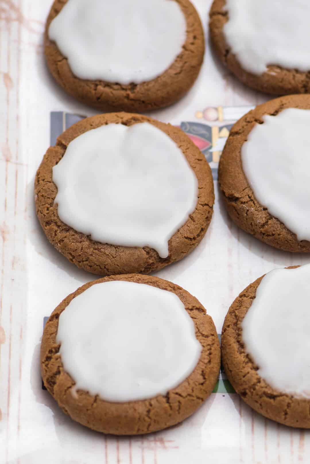 Chewy Iced Molasses Cookies on a tray.