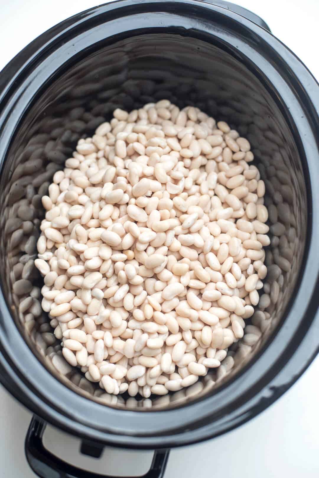 Great Northern beans in a slow cooker.