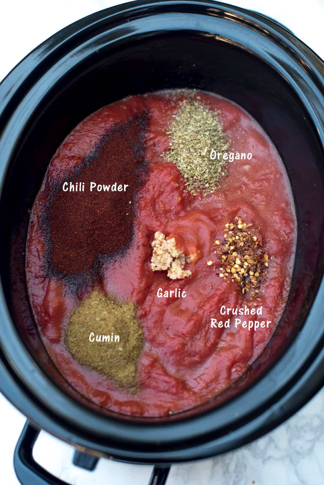 Ingredients in a slow cooker with text overlay.