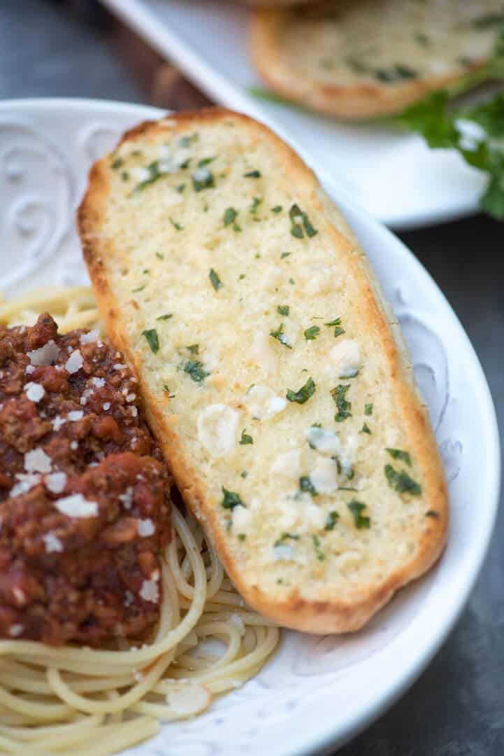 Make use of leftover sandwich rolls to create this easy peasy Cheater Garlic Bread. It takes just minutes to prepare and is surprisingly delicious!