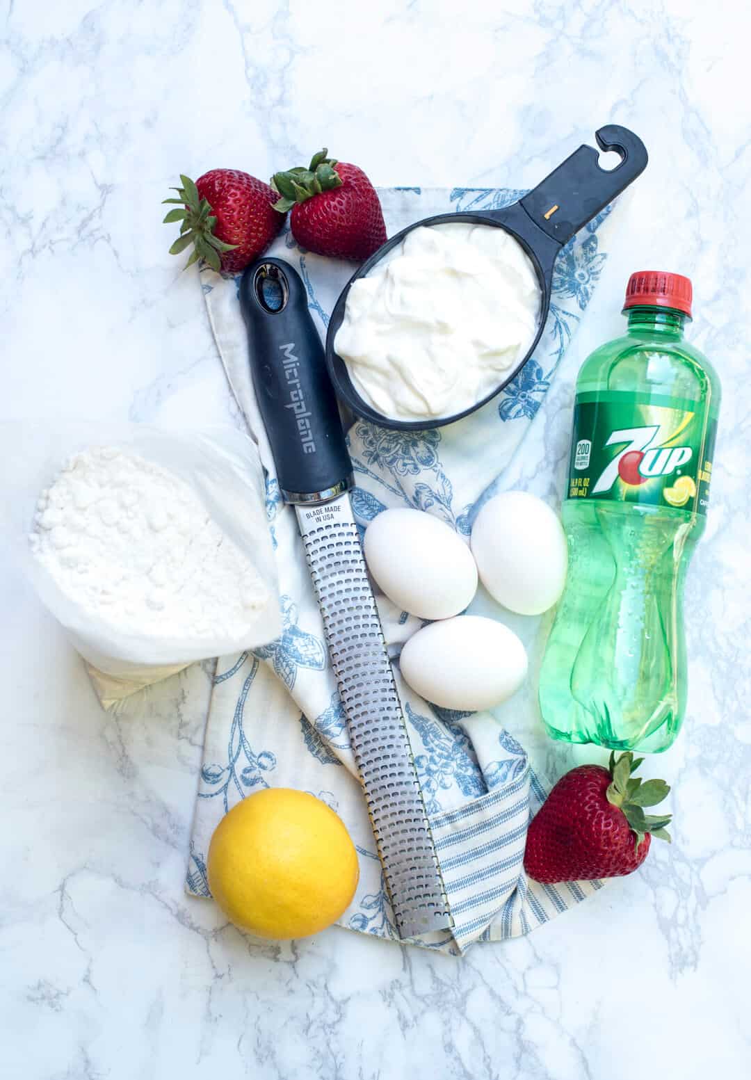 All the ingredients necessary to make 7UP Sheet Cake with Strawberry Buttercream Frosting