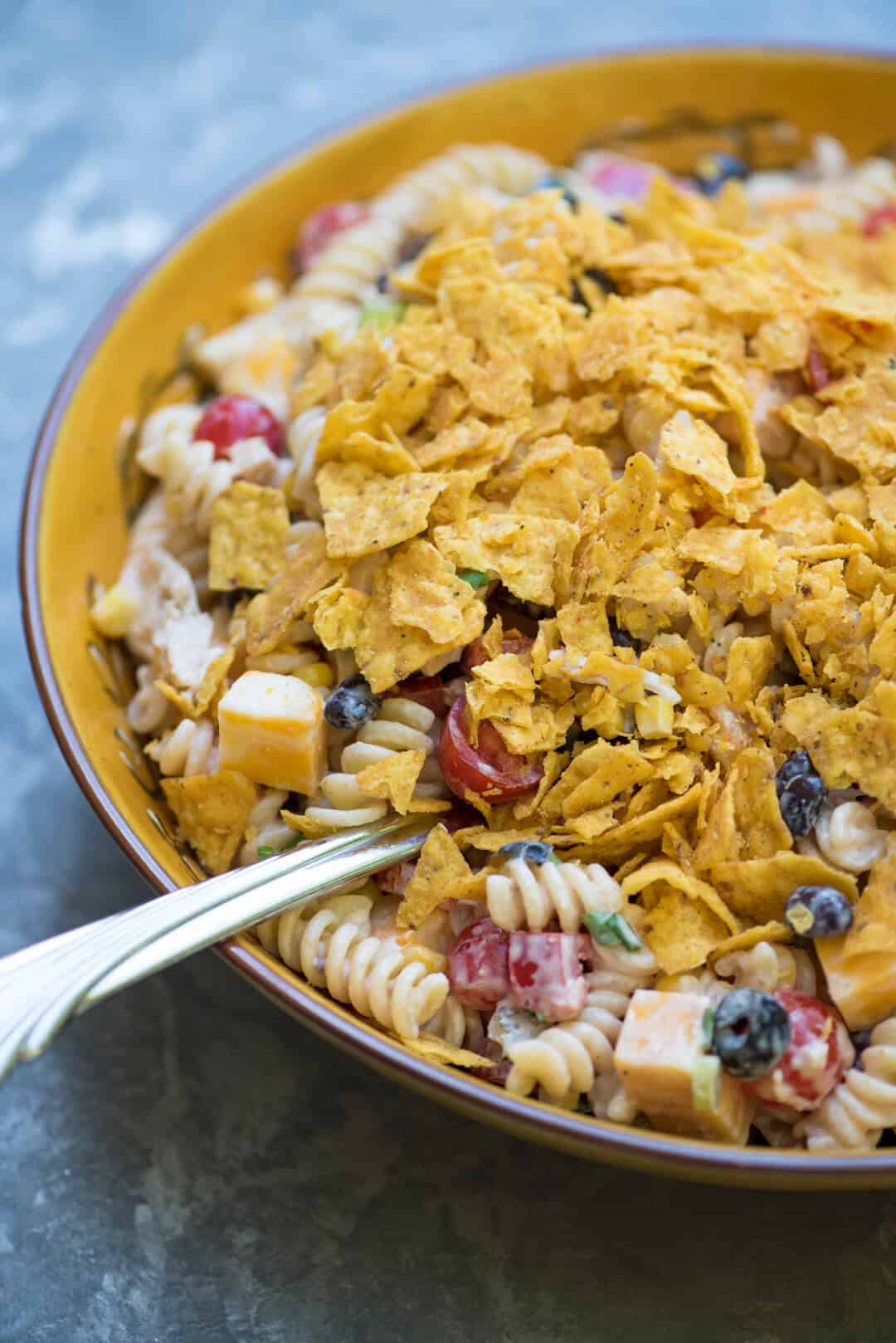 A close up of the Southwest Ranch Chicken Pasta Salad in a large serving bowl.