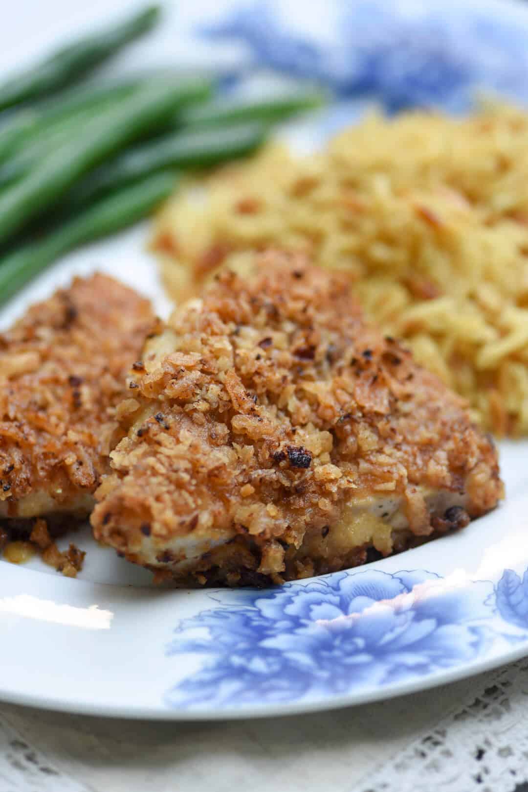 A close up of crispy chicken on a plate.
