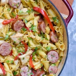 A skillet filled with Cheesy Cajun Pasta shot from over the top.