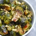 A bowl filled with Sweet Chili Roasted Brussels Sprouts.