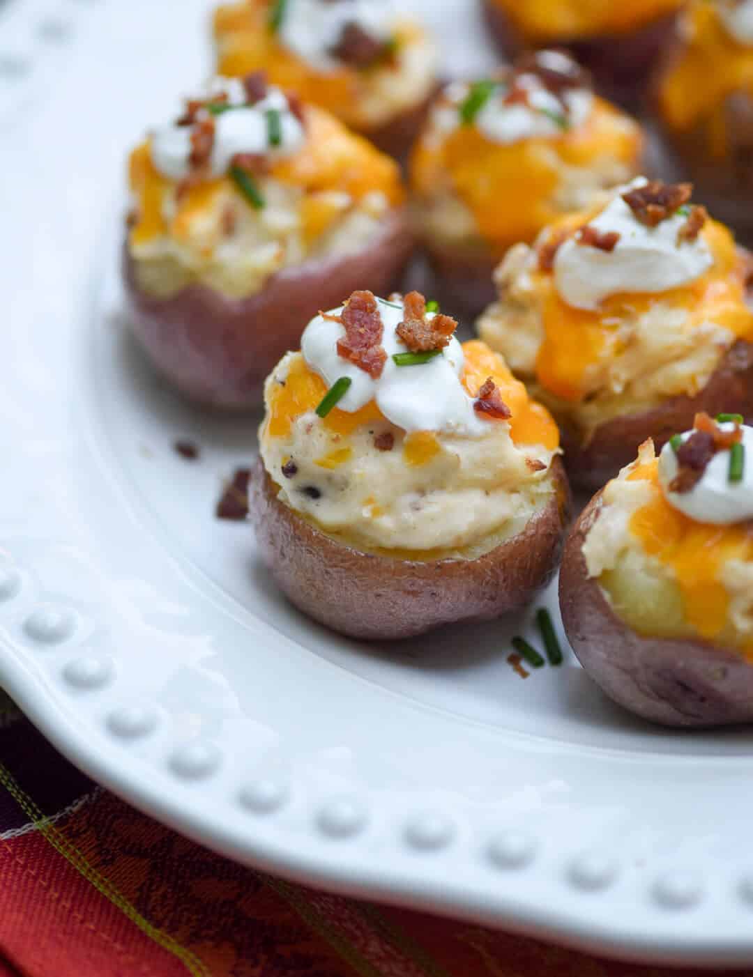 A close up of stuffed baby potatoes.