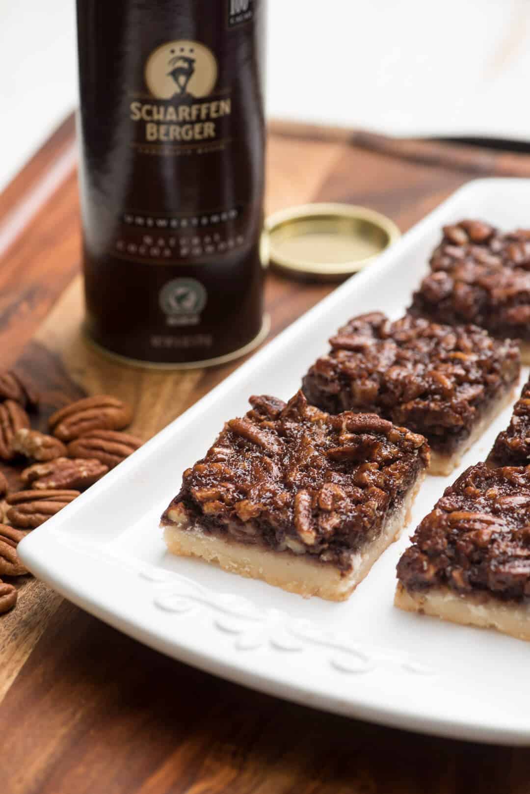 These Chocolate Bourbon Pecan Pie Bars have a shortbread crust topped with a gooey, chocolaty, bourbon-spiked pecan topping that is downright heavenly. 