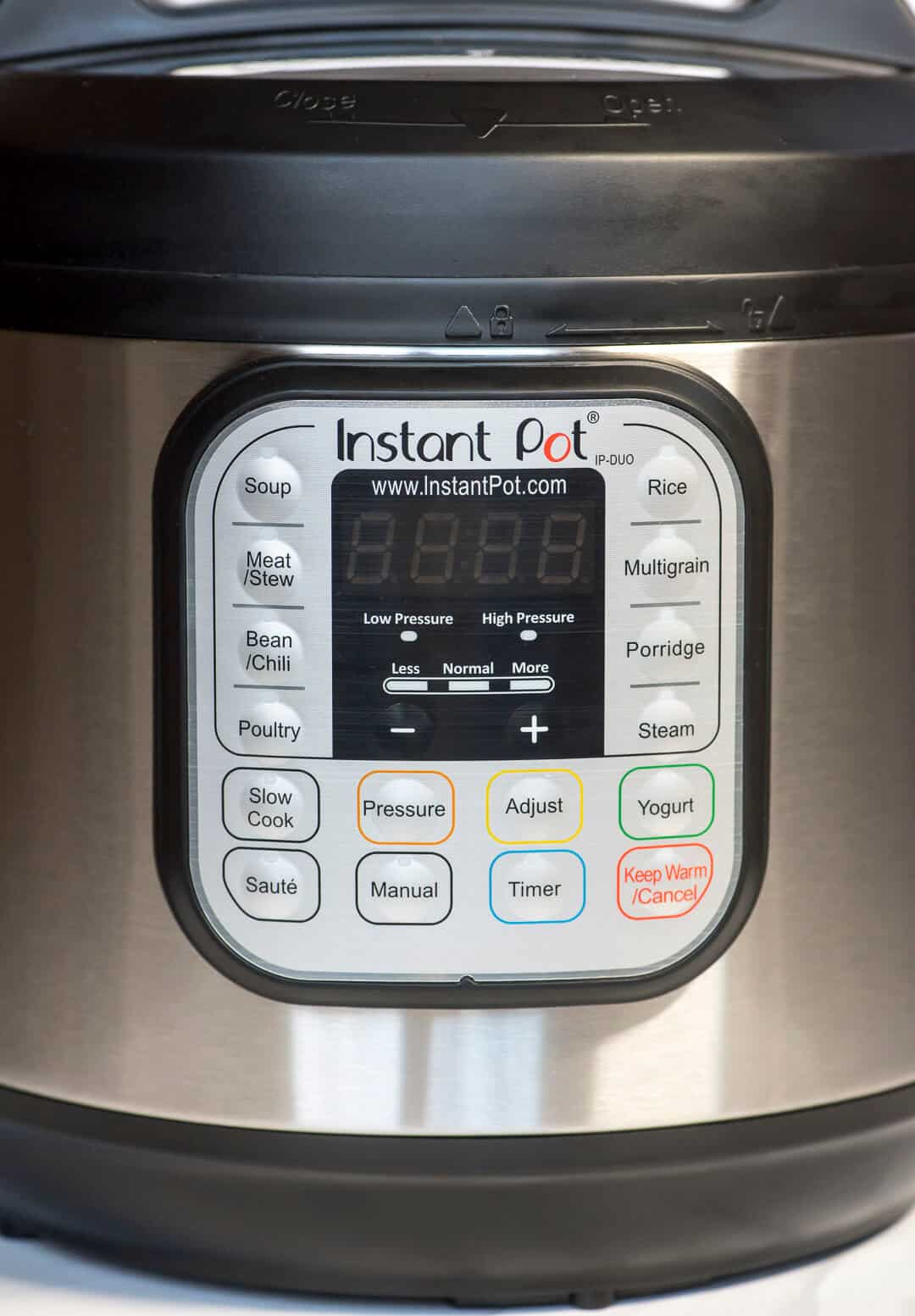A close up image of the controls on the front of the Instant Pot.