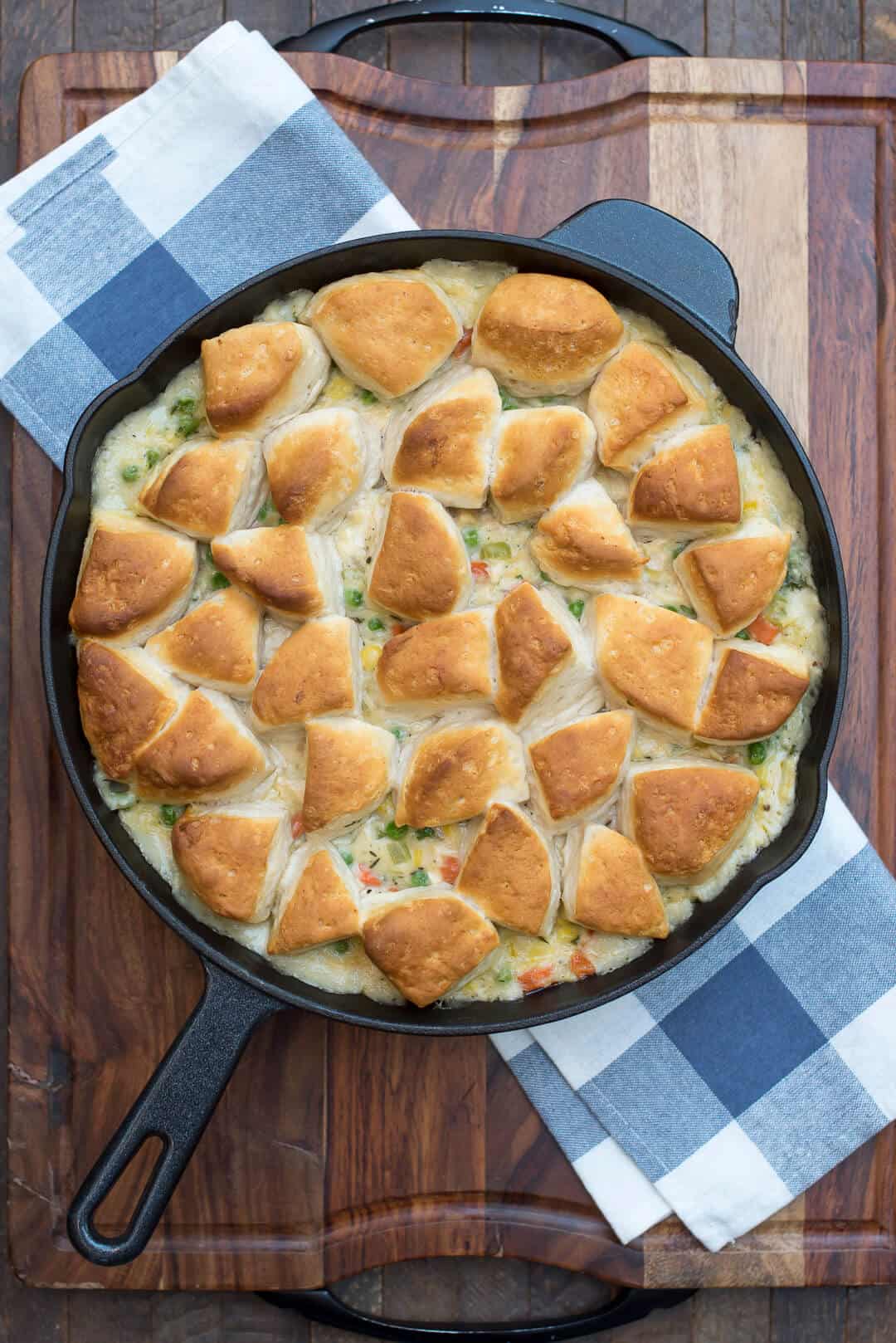 An over the top image of pot pie in a cast iron skillet.