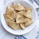 Homemade pita chips in a white bowl.