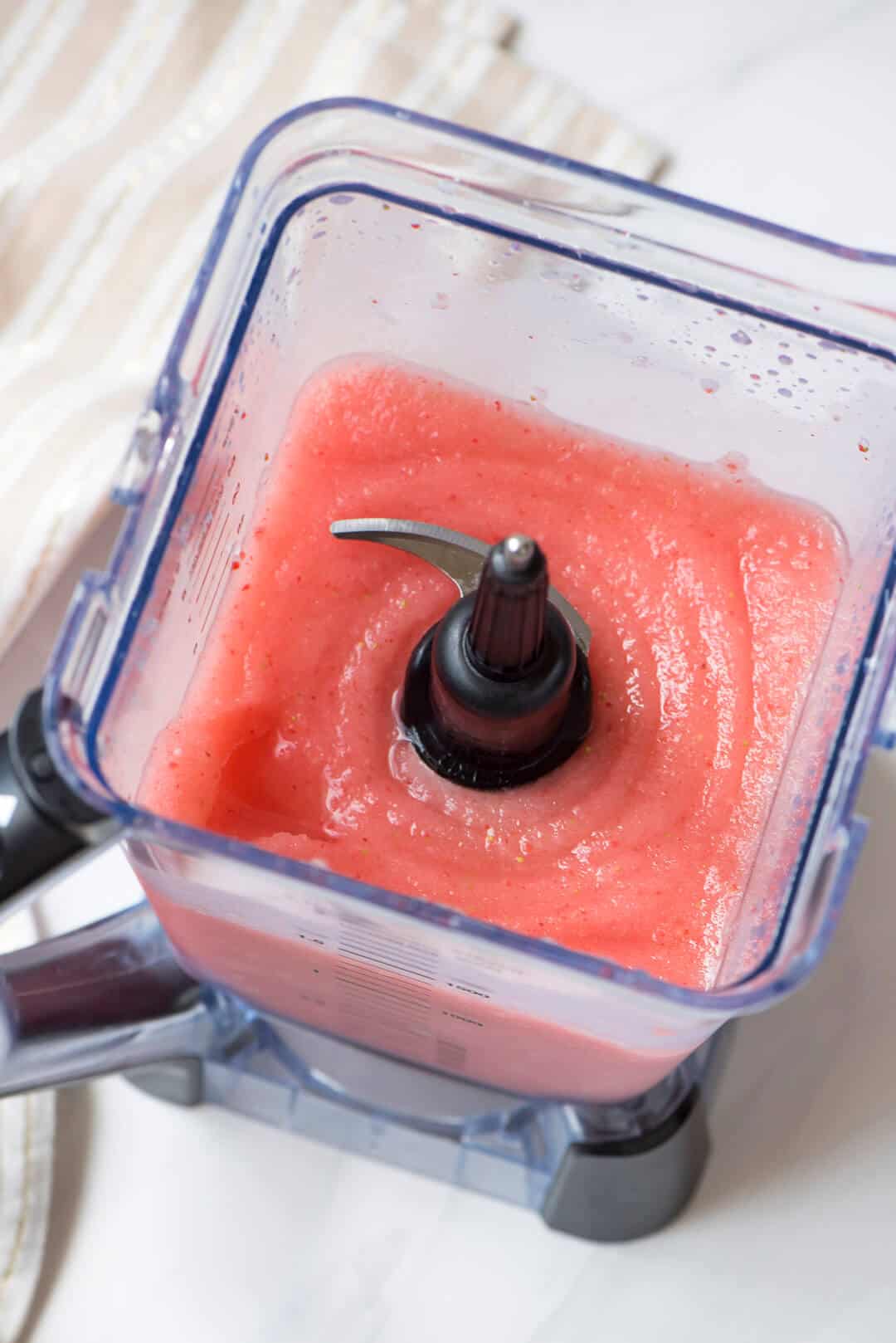An over the top image showing the inside of the blender after the ingredients have been processed.