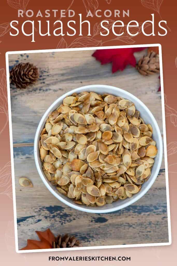 Roasted acorn squash seeds in a small bowl with text overlay.