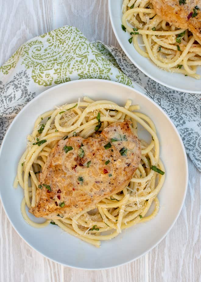 Creamy Lemon Chicken with Pasta in a serving bowl.