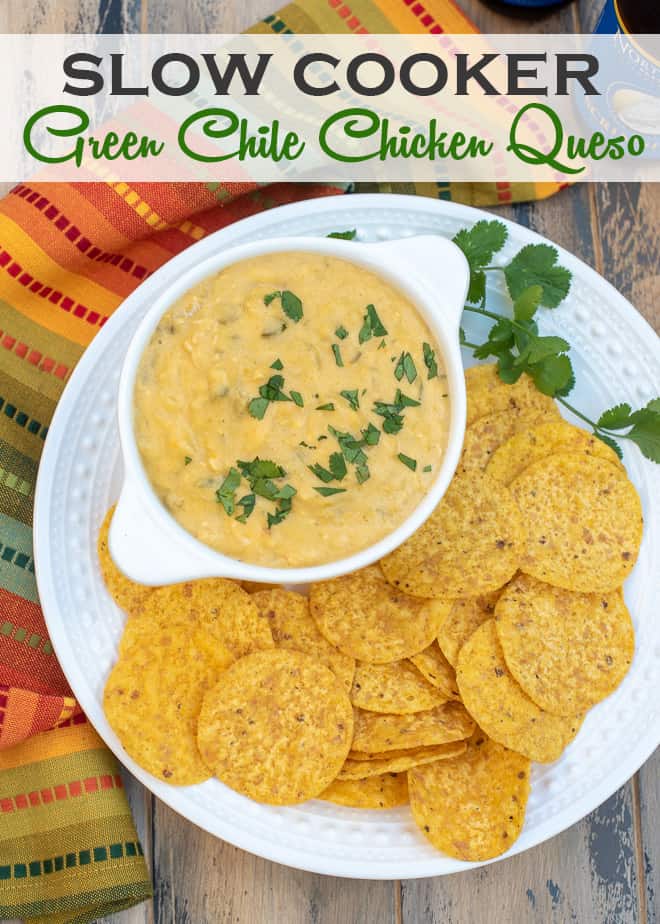 A bowl of queso dip with tortilla chips on a white plate with overlay text.