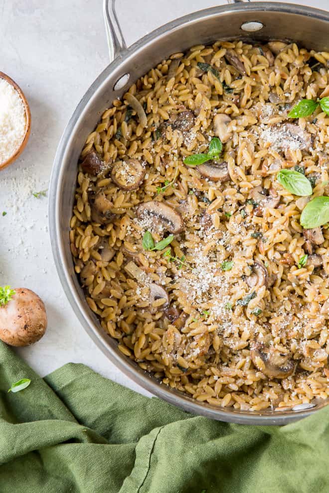 Creamy Orzo with Mushrooms and Parmesan in a saute pan.