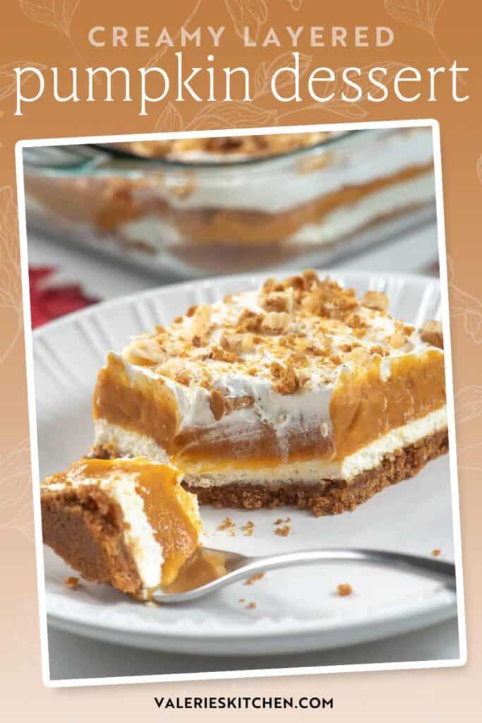 A fork resting on a plate with a slice of layered pumpkin dessert with text overlay.