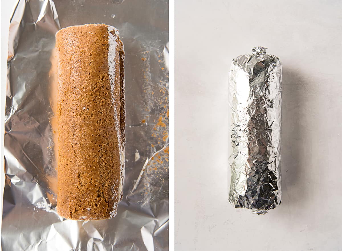A pumpkin roll resting on a sheet of aluminum foil and then enclosed in the foil.