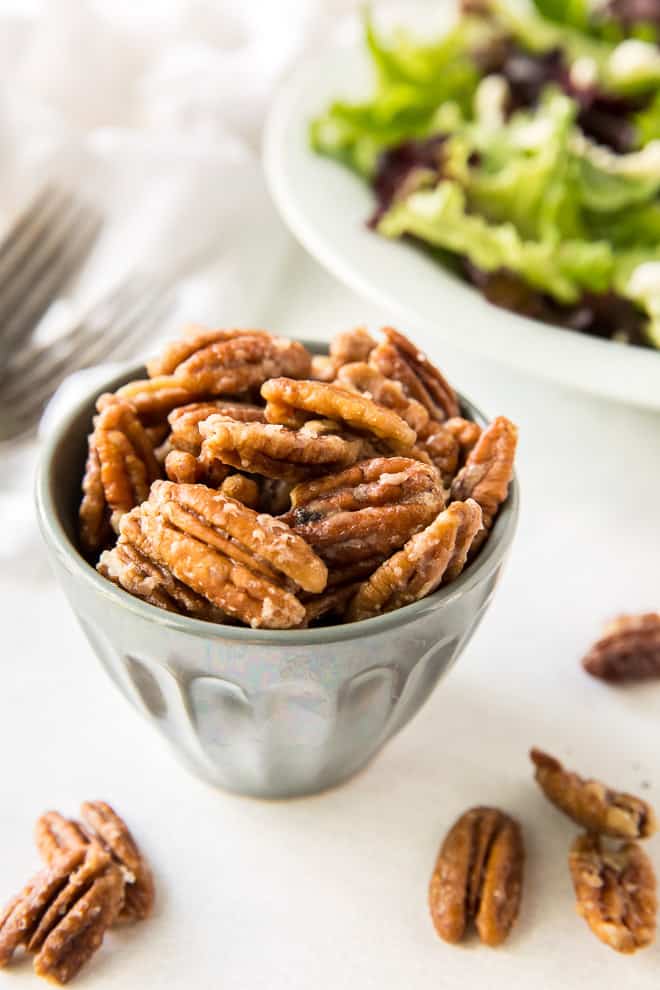 Glazed nuts in a small bowl.