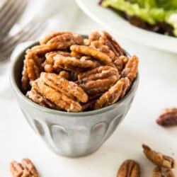 Glazed nuts in a small bowl.