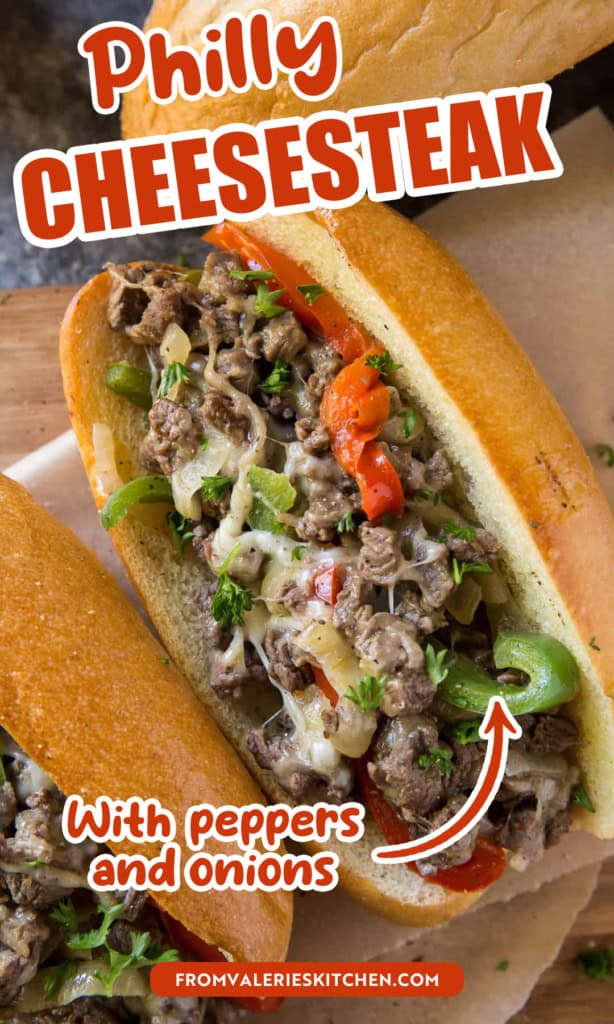 A philly cheesesteak sandwich with peppers and onions with text overlay.