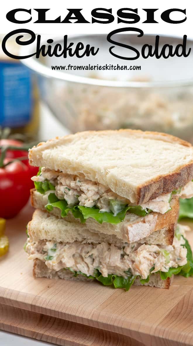 A Classic Chicken Salad Sandwich sliced in half and stacked on a cutting board with overlay text.