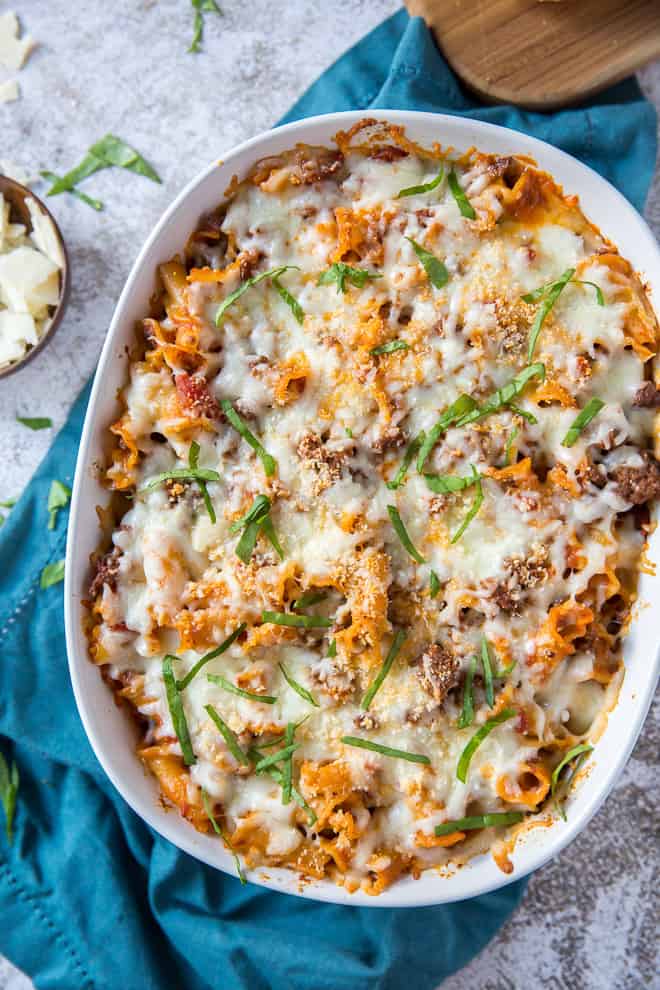 Lazy Lasagna Casserole in a white casserole dish. This recipe uses pantry staples you can easily stock.