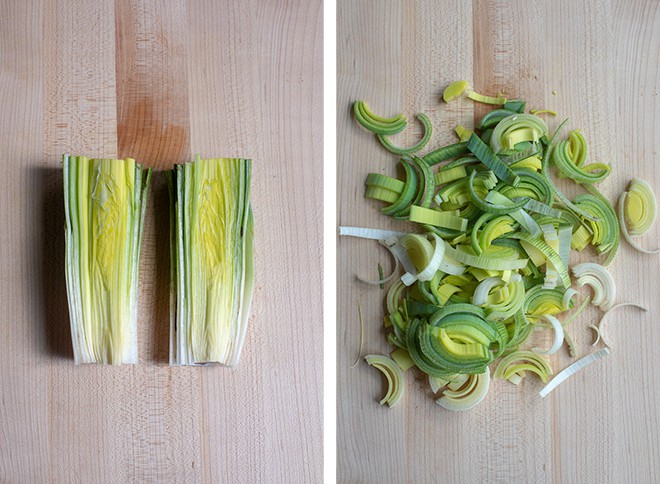 Two in process images showing the leek cylinder sliced in half lengthwise and then sliced crosswise into 1/2-inch slices.