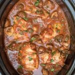 An overhead image of Slow Cooker Chicken Cacciatore in a Crock Pot insert.