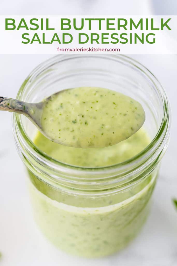 A spoon lifts Basil Buttermilk Salad Dressing from a mason jar with text overlay.