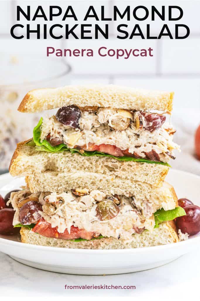 A Napa Almond Chicken Salad Sandwich sliced in half and stacked on a white plate with text overlay.