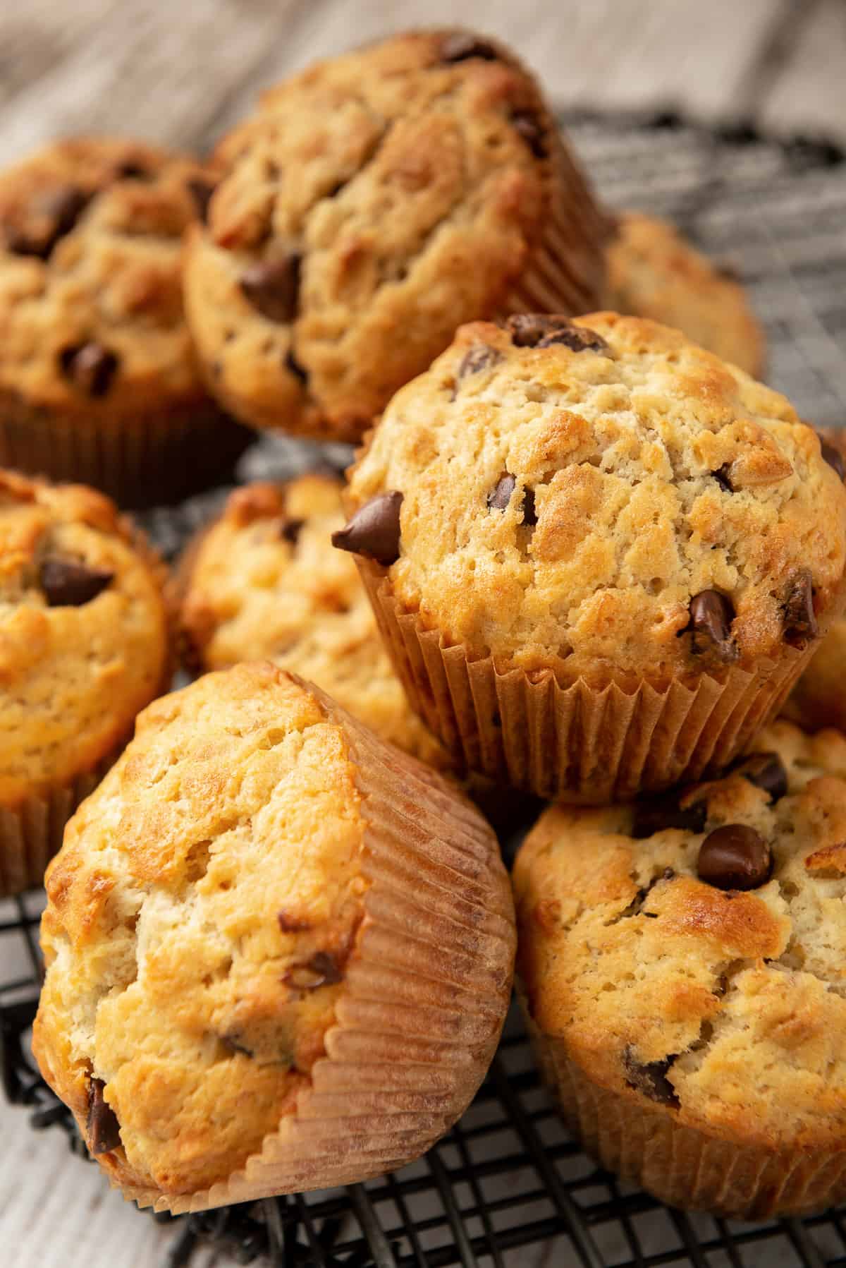 A close up of a pile of muffins.