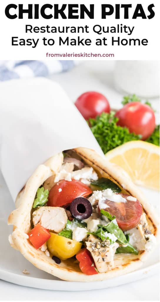 A closeup of a pita stuffed with grilled chicken and vegetables with text overlay.