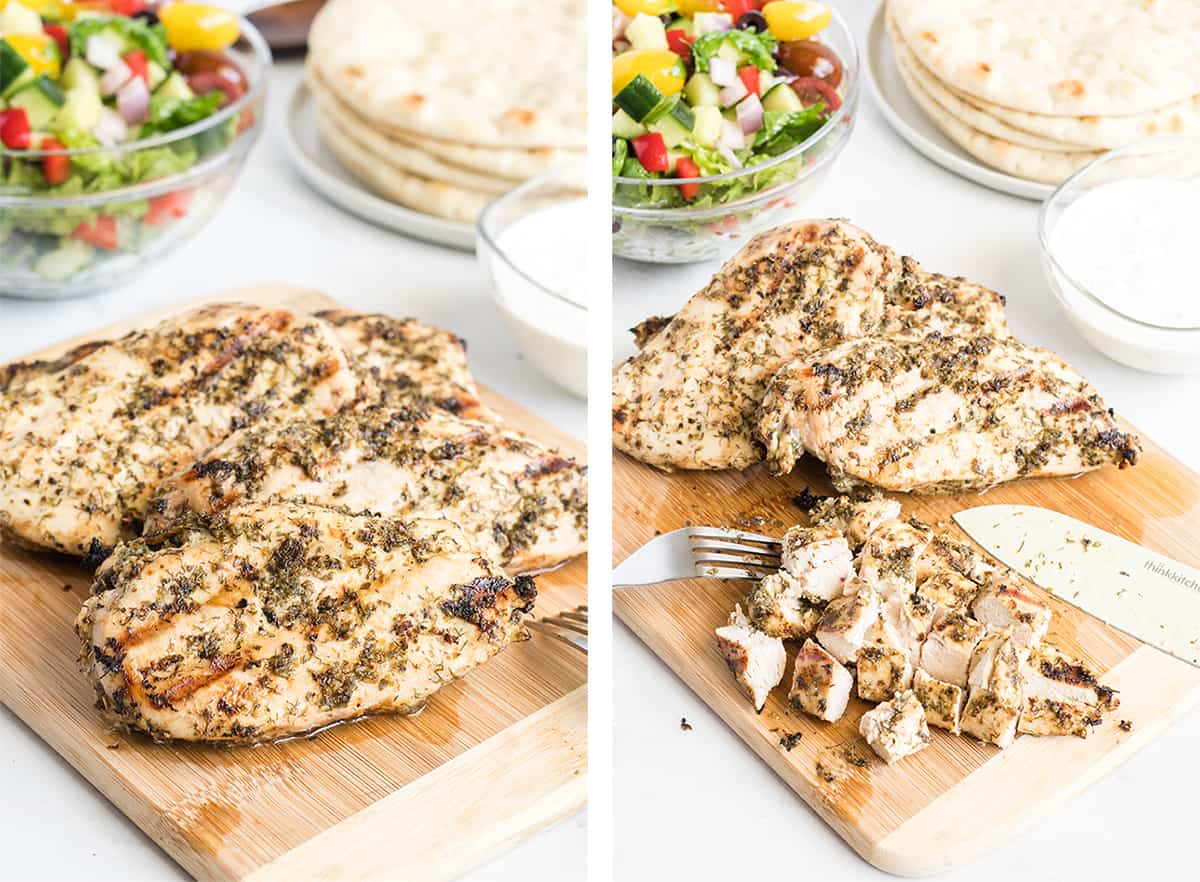 Grilled Greek chicken being sliced on a cutting board.