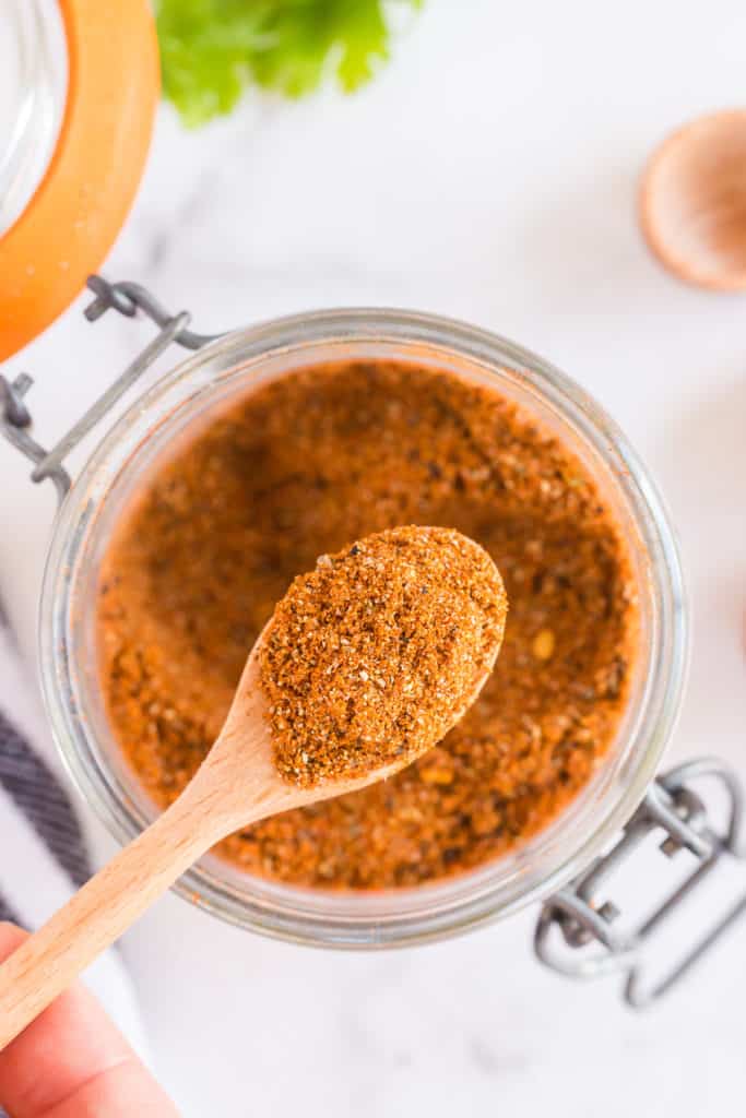 A small spoon scoops up Homemade Taco Seasoning Mix