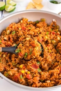 A skillet filled with Spanish Rice with Ground Beef.