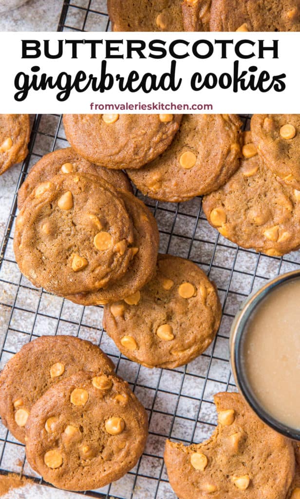 A pile of Butterscotch Gingerbread Cookies, one with a bite missing, on a wire rack with text overlay.