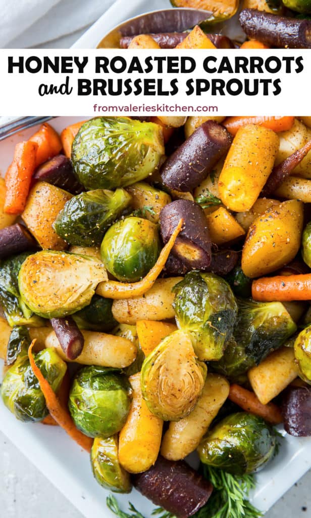 Honey Roasted Carrots and Brussels Sprouts on a white platter with text overlay.