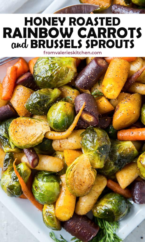 Honey Roasted Rainbow Carrots and Brussels Sprouts on a white platter with text overlay.