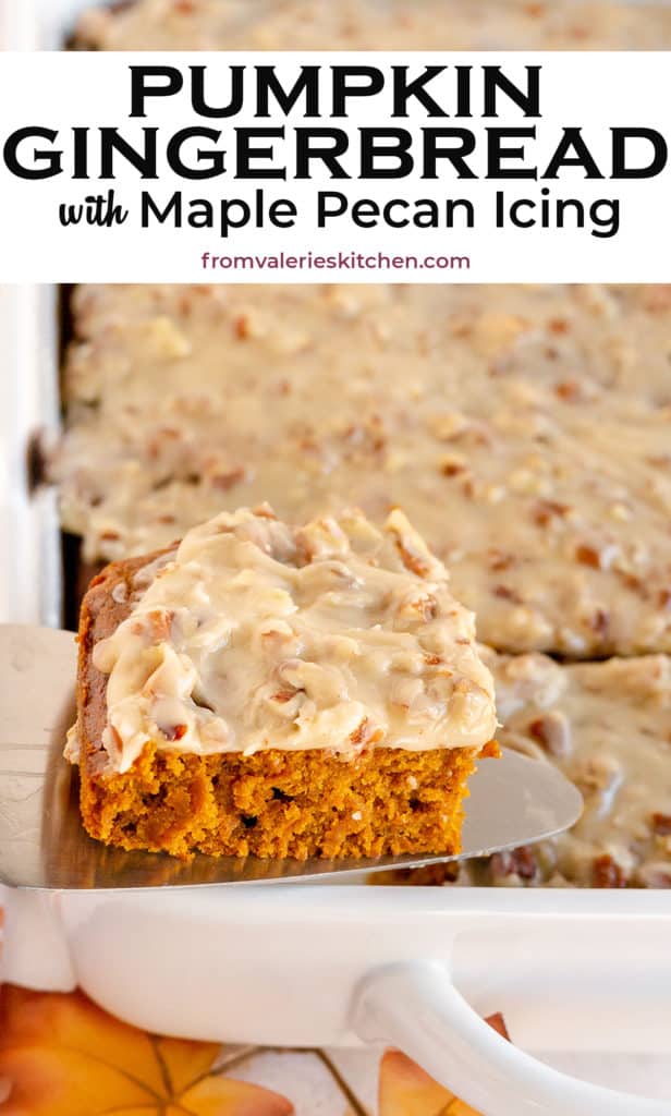 A spatula lifts a slice of Pumpkin Gingerbread from a baking dish.