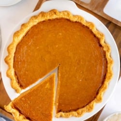 A spatula lifts a slice of pie.