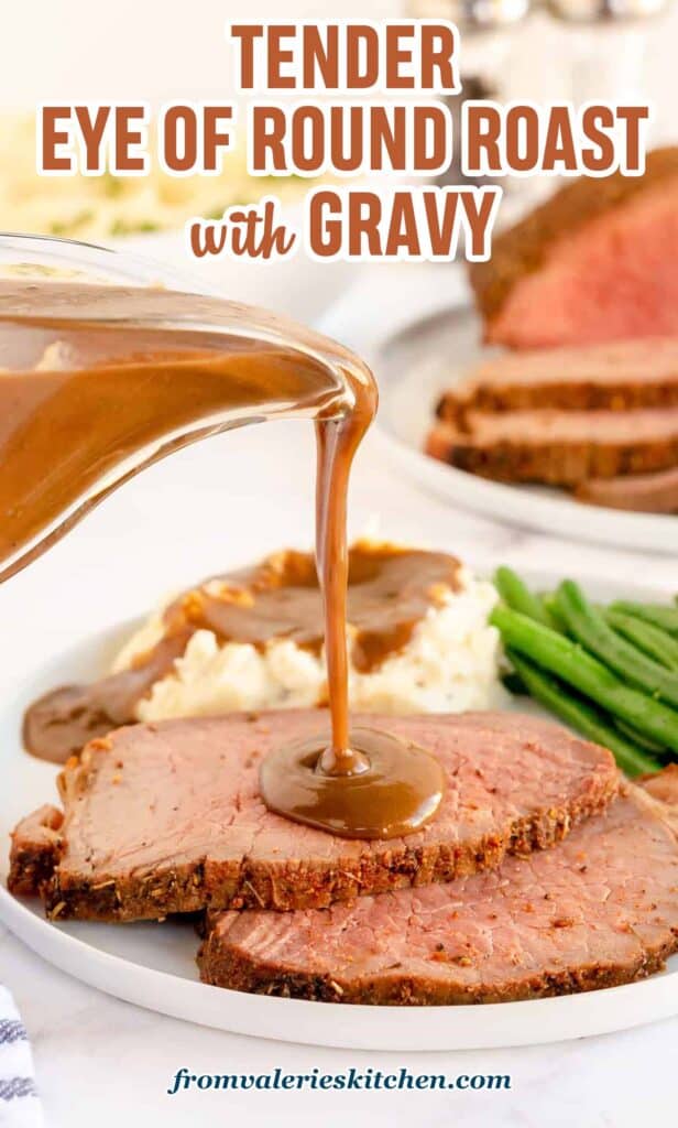 Gravy pouring from a gravy boat over slices of eye of round roast on a dinner plate with text.
