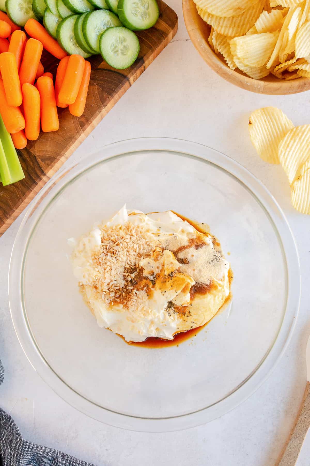 Dip ingredients are combined in a mixing bowl.