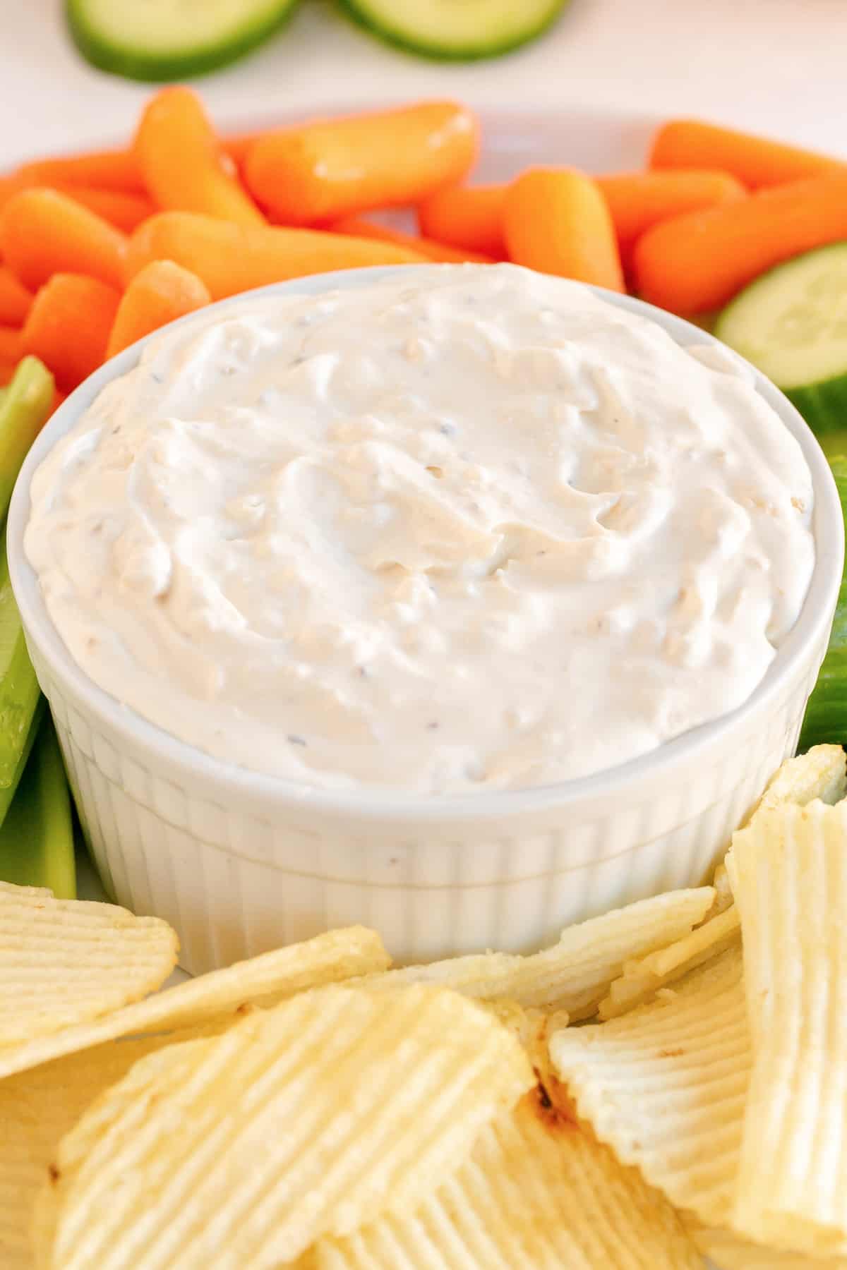 A close up of French Onion Dip in a small white dish.