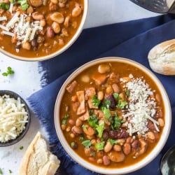 Two bowls of bean soup in front of an Instant Pot.