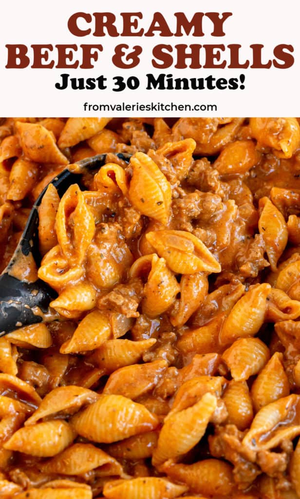 A closeup of a spoon scooping Creamy Beef with shell pasta with text overlay.