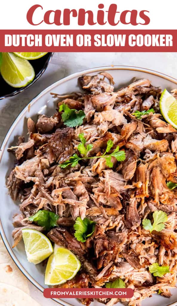 Shredded pork carnitas on round platter with lime wedges with text overlay.