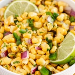 A closeup of a bowl of corn salsa.