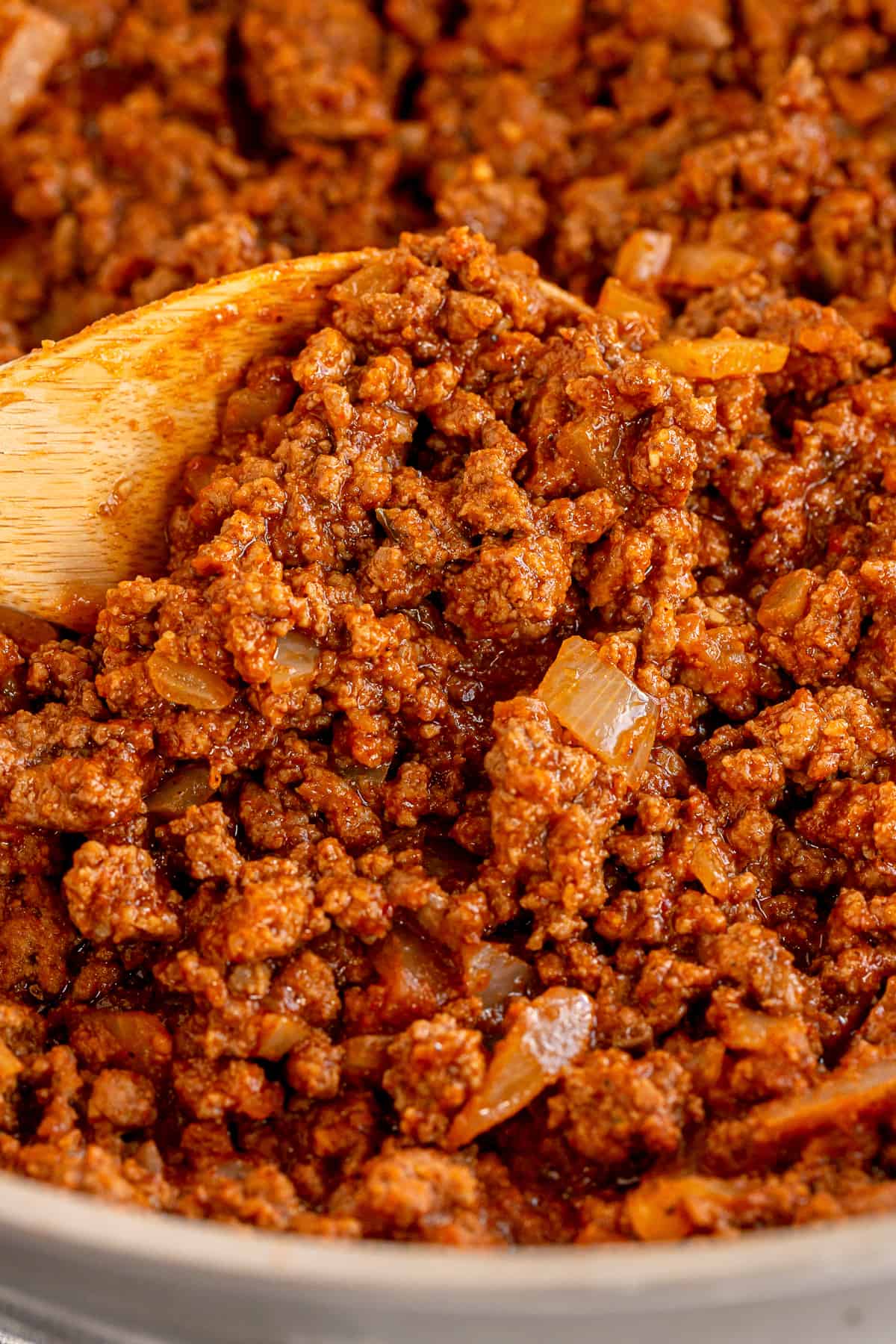 A close up of ground beef taco filling in a skillet.