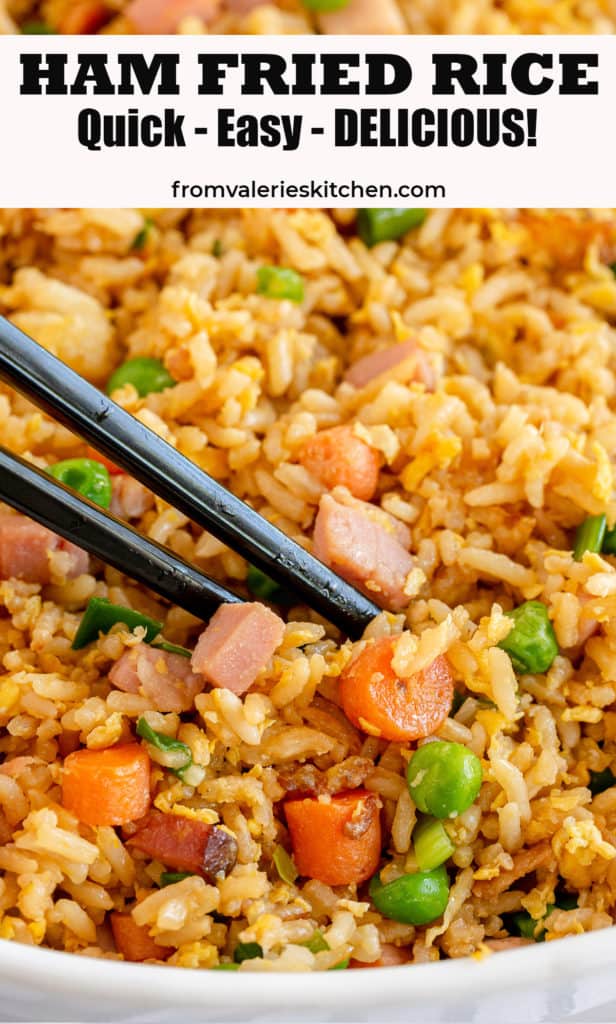 A close up of chopsticks digging into Ham Fried Rice with text overlay.