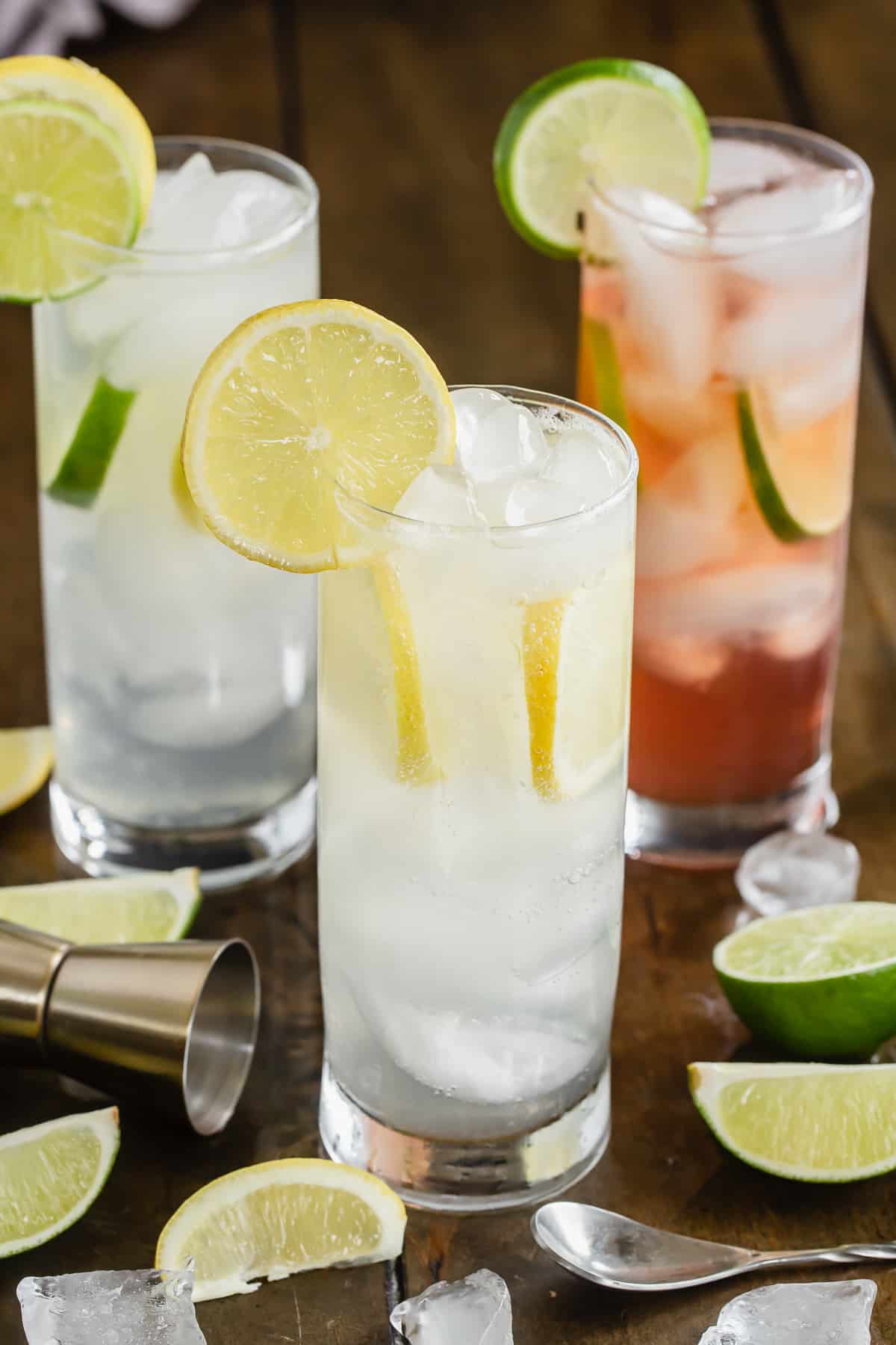 Three variations of Ranch Water in glasses with lemon and lime slices.